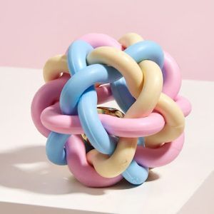 pastel interlocking puzzle ball dog toy with bell